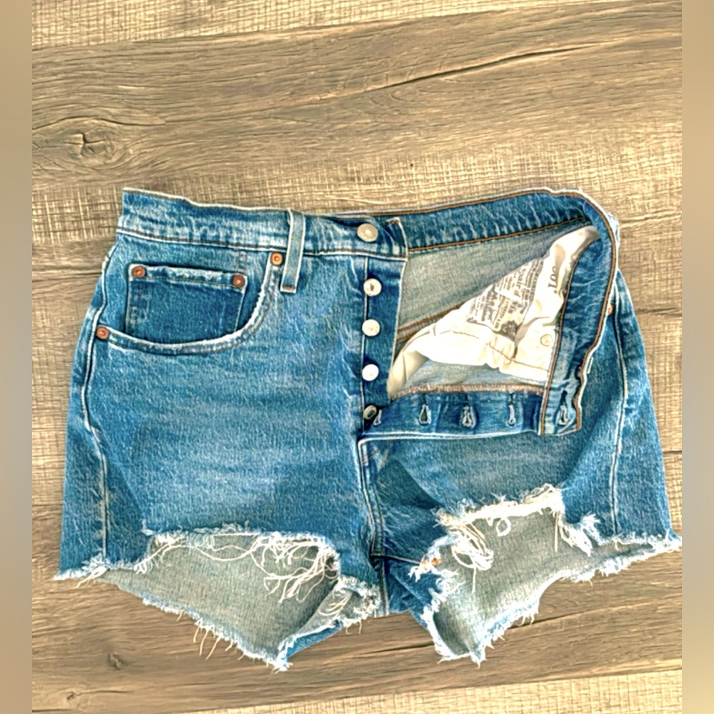 Women’s distressed 501 Levi  jeans shorts Size 30.. Send your best offer